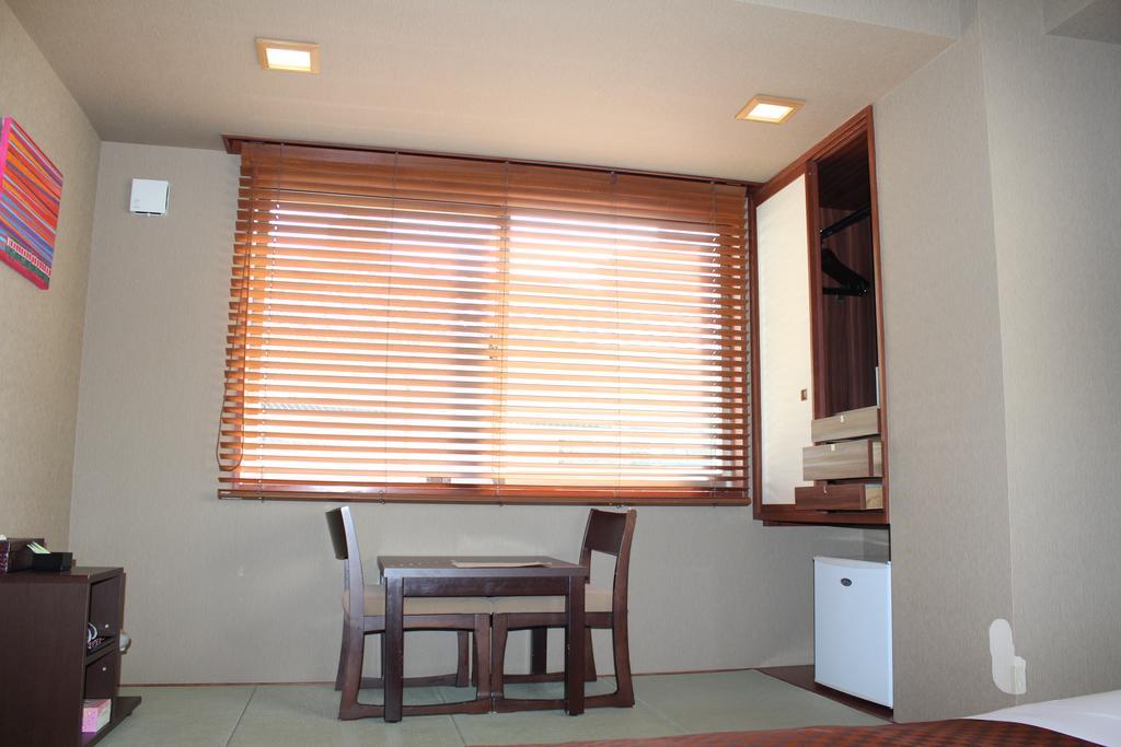 Hotel Saika Fujisawa Quarto foto